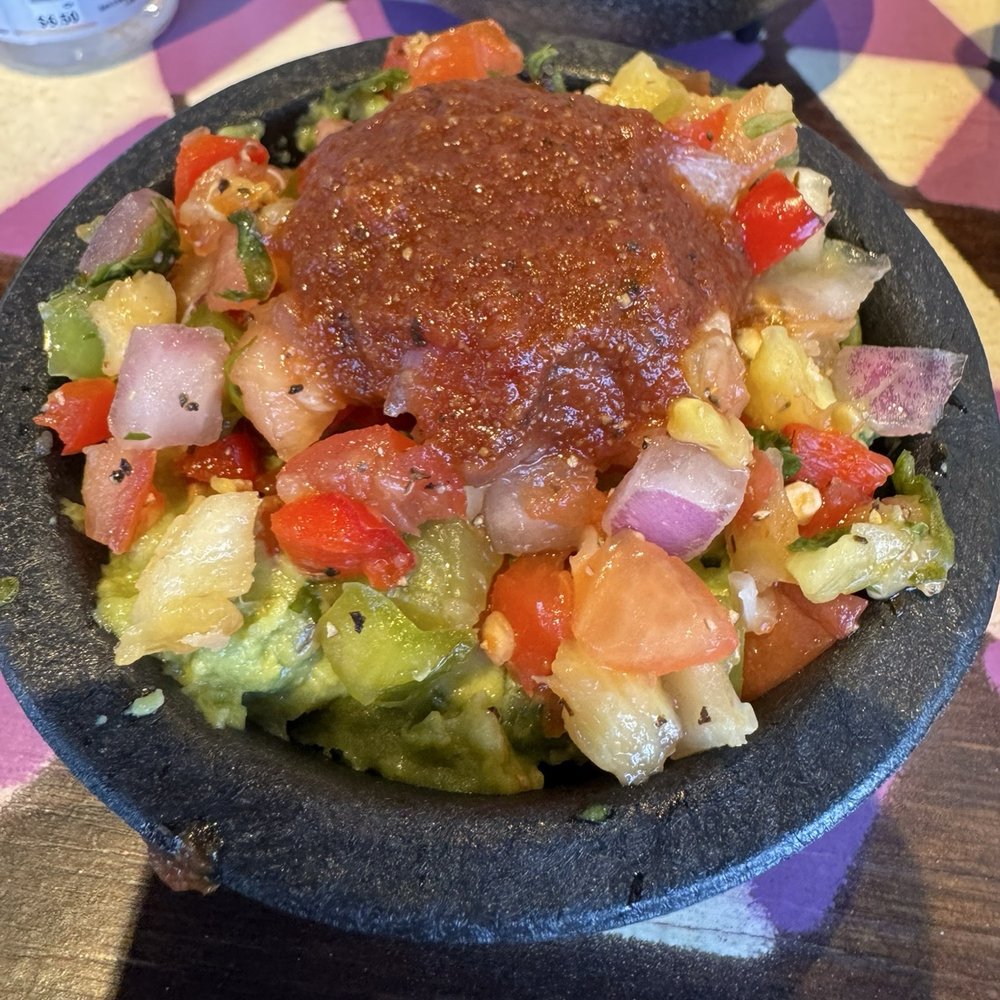 The pineapple guacamole is so creamy and delicious. The pineapple guacamole is so creamy and delicious.