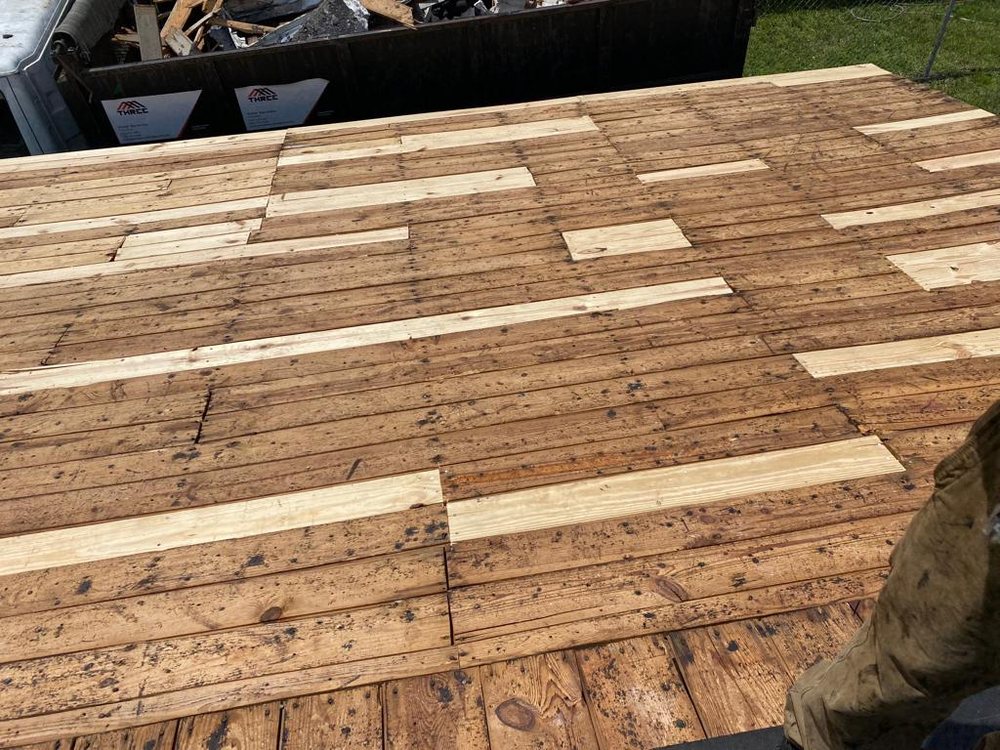 Slide of Three Brothers Roofing