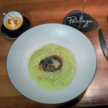 Partage - Course 2 - lobster flan, squid ink ravioli with lobster and crouton - French Near Me - Las Vegas, Nevada