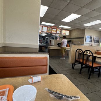 Whataburger - a restaurant with tables and chairs - Burgers Near Me - La Grange, Texas