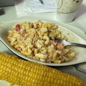 Cascade Cafe - My underwhelming "homemade" Mac n cheese. Portion looks way bigger than it is. The lobster was an $8 up charge for like two pieces. - Cafes Near Me - Hampton, New Hampshire