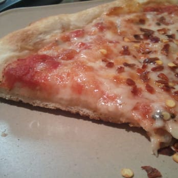 Primo Pizza NY Style - A picture to show the crust thickness. Just ignore my slight obsession with crushed red pepper... - Pizza Near Me - Cary, North Carolina Primo Pizza NY Style - A picture to show the crust thickness. Just ignore my slight obsession with crushed red pepper... - Pizza Near Me - Cary, North Carolina
