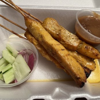 Thai Kitchen O'Fallon - Chicken satay with peanut sauce and cucumber/red onion salad - Thai Near Me - O'fallon, Missouri Thai Kitchen O'Fallon - Chicken satay with peanut sauce and cucumber/red onion salad - Thai Near Me - O'fallon, Missouri