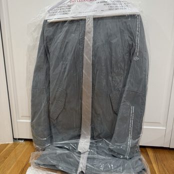 Sy Cleaners & Tailors - Winter coat and tie - Dry Cleaning Near Me - Stamford, Connecticut