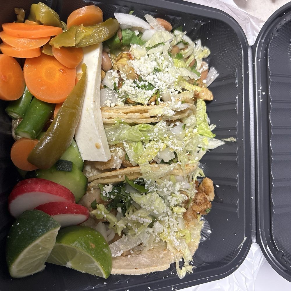 2 fish tacos and 1 chicken taco 2 fish tacos and 1 chicken taco
