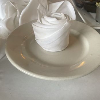 Sun Ray Grill - a white plate with a napkin on it - Diners Near Me - Gretna, Louisiana Sun Ray Grill - a white plate with a napkin on it - Diners Near Me - Gretna, Louisiana