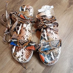 Titi & Tata Thrift Boutique - Like-new multicolor, snakeskin sandals, only $5.99.