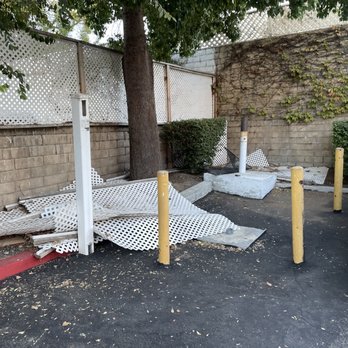 Holiday Inn Express Simi Valley - Fencing that has fallen down and now has been kind of thrown in the corner of the parking lot. - Hotels Near Me - Simi Valley, California
