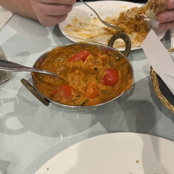 Grand Taj - Half eaten butter chicken - Indian Near Me - Riverside, California