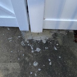 Sloppy cement around posts on my patio.
