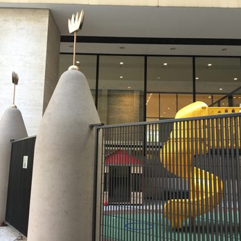 Miro Statue - Attached crown themed playground for kids...I think that it belongs to the church nearby? - Public Art Near Me - Chicago, Illinois