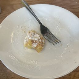 A mostly eaten mochi waffle VERY GOOD! A mostly eaten mochi waffle VERY GOOD!