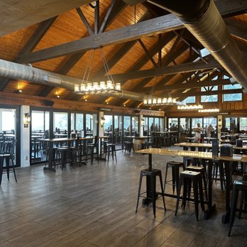 Bear Chase - the inside of a restaurant with tables and chairs - Breweries Near Me - Bluemont, Virginia