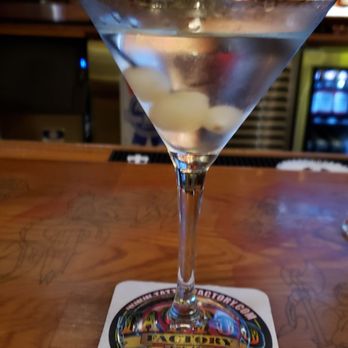 Drink and Ink - a martini on a coaster - Pubs Near Me - Chicago, Illinois
