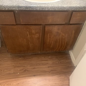 The Brook on Bay Area - Paint on floor & cabinets when I received the apartment - Apartments Near Me - Webster, Texas