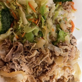 Hana Kitchen - Beef with vegetables and steam rice ! and some plastic sh.. in it - Asian Fusion Near Me - Isla Vista, California