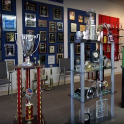 Buena Park Plaque & Trophy - Our showroom showcasing a variety of trophies, plaques, crystal glass, custom engraving, banners