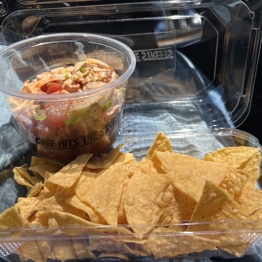1/2lb ahi with chips - on the side.  He will put over chips if you want!