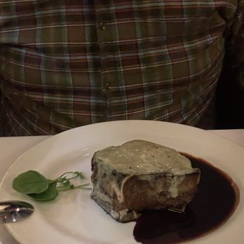 The Capital Grille - Gorgonzola-Crusted Dry Aged Bone-In NY/KC Strip with Cabernet Reduction - Steakhouses Near Me - Seattle, Washington The Capital Grille - Gorgonzola-Crusted Dry Aged Bone-In NY/KC Strip with Cabernet Reduction - Steakhouses Near Me - Seattle, Washington