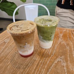 Iced latte with strawberry syrup (left) and iced matte latte (right)