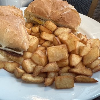 Auction Barn Restaurant - Egg and cheese on a roll with home fries - Diners Near Me - Argyle, New York