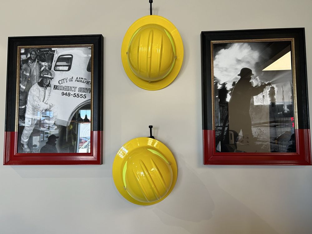 Firehouse Subs Airdrie Sierra Springs Logo