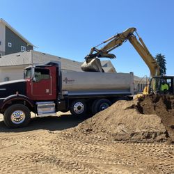 Integrity Trucking - Getting loaded with export dirt