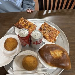 2 slices of cheese, 2 arancini, and 1 ham and cheese calzone