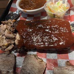 PBR Cowboy Bar + Smokehouse - Meats combo with ribs, brisket, pulled pork, beans and Cole slaw.