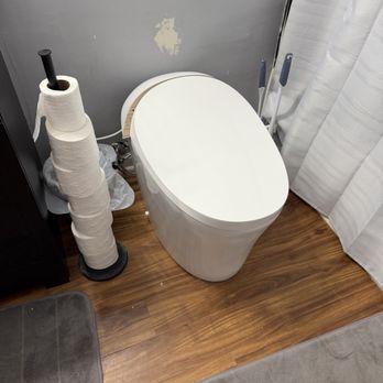 Village Son - Fancy toilet install - Plumbing Near Me Village Son - Fancy toilet install - Plumbing Near Me