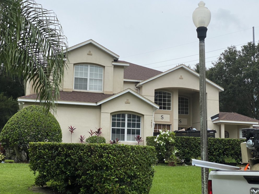 Slide of The Roofing Experts