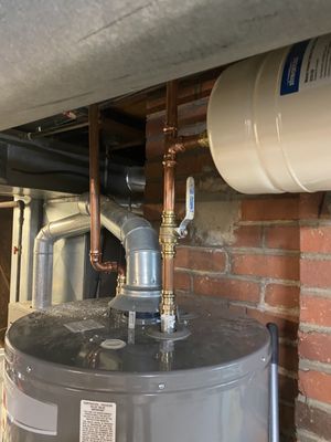 Hot water tank repair - 30 gallon tank replacement in ceiling with expansion tank Hot water tank repair - 30 gallon tank replacement in ceiling with expansion tank