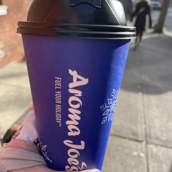 Aroma Joe’s - a hand holding a cup of coffee - Coffee & Tea Near Me - Providence, Rhode Island Aroma Joe’s - a hand holding a cup of coffee - Coffee & Tea Near Me - Providence, Rhode Island