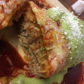El Gallito - Inside the burrito mojado (wet burrito). Super good and tasty, filling too. Topped with mozzarella, queso fresco, guacamole and crema. - Mexican Near Me - Los Angeles, California El Gallito - Inside the burrito mojado (wet burrito). Super good and tasty, filling too. Topped with mozzarella, queso fresco, guacamole and crema. - Mexican Near Me - Los Angeles, California