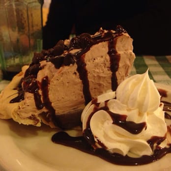 Pine Country Restaurant - Homemade double chocolate pie. So big it's good to share between two people - Breakfast & Brunch Near Me - Williams, Arizona Pine Country Restaurant - Homemade double chocolate pie. So big it's good to share between two people - Breakfast & Brunch Near Me - Williams, Arizona