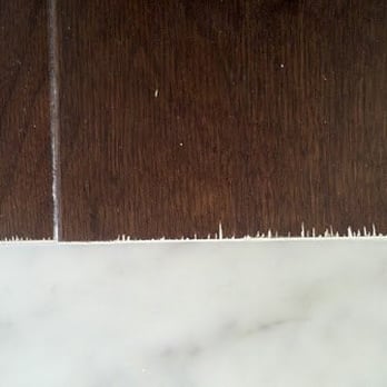Bixby Knolls Carpet & Flooring - this is how they left it. i had to call and ask them to come back and install a t mold - Carpeting Near Me - Orange, California