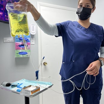 Core IV Therapy - Silvia posing with the post covid drip - IV Hydration Near Me - Herndon, Virginia