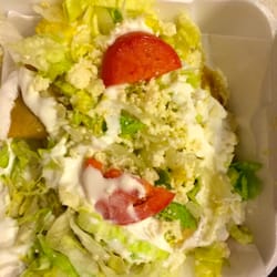 There are two carne asada empanadas under there.