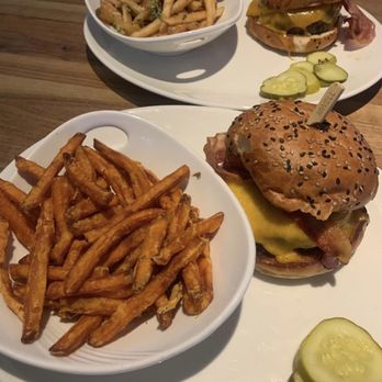 Yard House - BBQ Bacon Cheddar burgers, parm truffle fries and sweet potato fries. (No ketchup as we were sitting there waiting for it) - New American Near Me - Burlington, Massachusetts Yard House - BBQ Bacon Cheddar burgers, parm truffle fries and sweet potato fries. (No ketchup as we were sitting there waiting for it) - New American Near Me - Burlington, Massachusetts