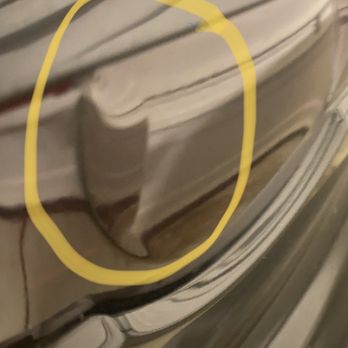 Dead Eye Tint & Vinyl - Both taillights have bubbles. The area circled in yellow should be flat like the rest of the surface. - Car Window Tinting Near Me - Temecula, California Dead Eye Tint & Vinyl - Both taillights have bubbles. The area circled in yellow should be flat like the rest of the surface. - Car Window Tinting Near Me - Temecula, California