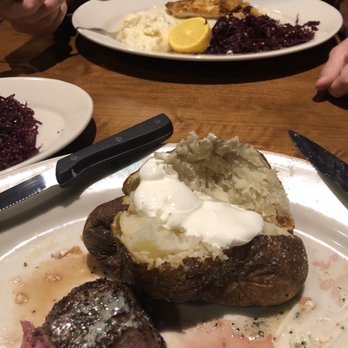 J. Alexander's - Filet- medium rare. Baked potato.  Grouper with crispy shrimp, mashed potatoes, & red cabbage - New American Near Me - Houston, Texas