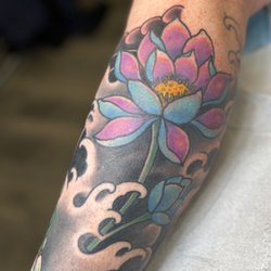 Steel City Tattoo - Color Japanese lotus and waves tattoo by John at Steel City Tattoo in Bethlehem, PA.
