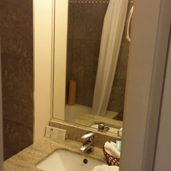 Barclay Hotel - Bathroom sink and mirror - Hotels Near Me - Vancouver, British Columbia