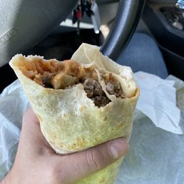 Asada burrito with sour cream and jalapeño