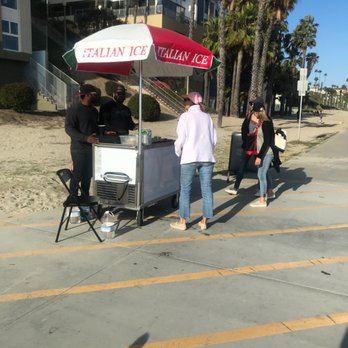 Flavor Champs - a man selling food on the sidewalk - Ice Cream & Frozen Yogurt Near Me Flavor Champs - a man selling food on the sidewalk - Ice Cream & Frozen Yogurt Near Me