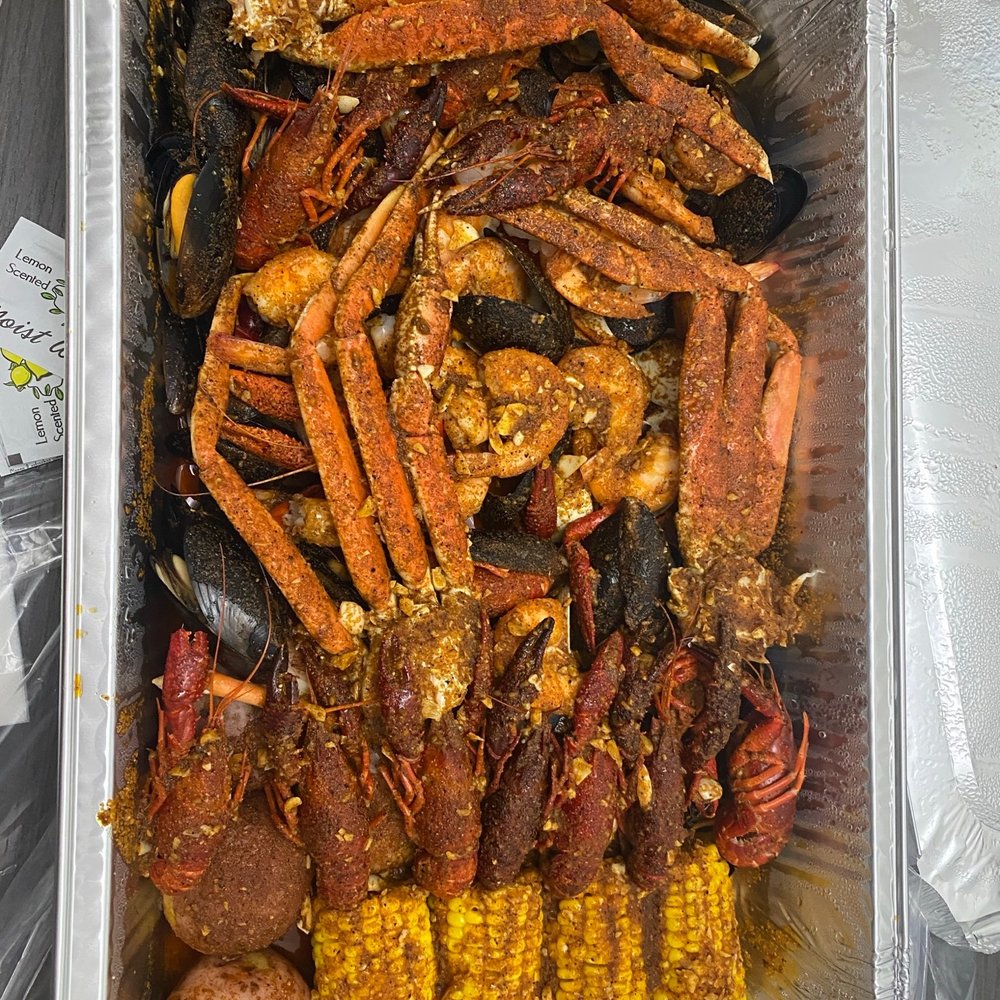 Hungry Crab - DRY! More seasoning than sauce. What was I going to spill with that packaging? - Seafood Near Me - Orlando, Florida Hungry Crab - DRY! More seasoning than sauce. What was I going to spill with that packaging? - Seafood Near Me - Orlando, Florida