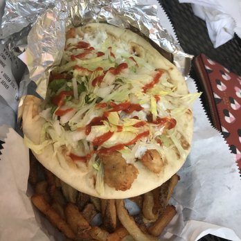 Gyro Bros - Fried Chicken Gryo no Tomatoes, light onions and lettuce with Sriracha!! - Greek Near Me - Atlanta, Georgia Gyro Bros - Fried Chicken Gryo no Tomatoes, light onions and lettuce with Sriracha!! - Greek Near Me - Atlanta, Georgia