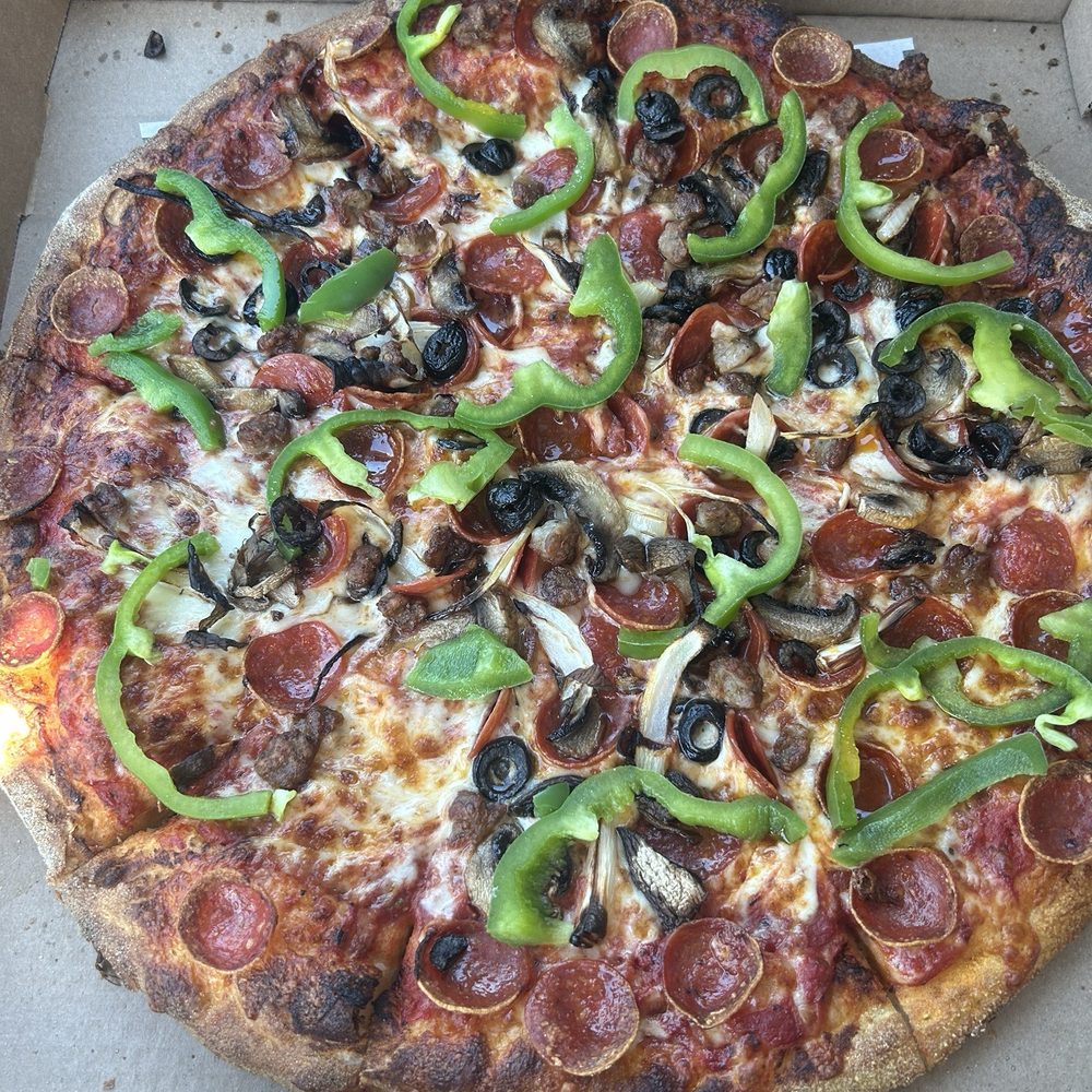 16" Deluxe Pizza. I asked for peppers to be raw 16" Deluxe Pizza. I asked for peppers to be raw