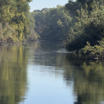 Jacob Myers Park - Stanislaus River looking east ( towards the Sierras) from boat ramp ( zoomed in ) - Parks Near Me - Riverbank, California