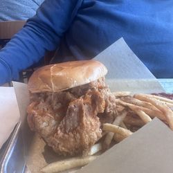 Buffalo Wild Wings - Side profile of chicken sandwich, no veggies only sauce. Her first thought was "how am I going to fit that in my mouth" lol